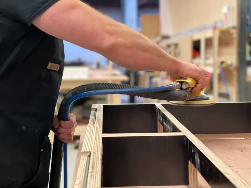 Pith & Stem Fold down desks being constructed.