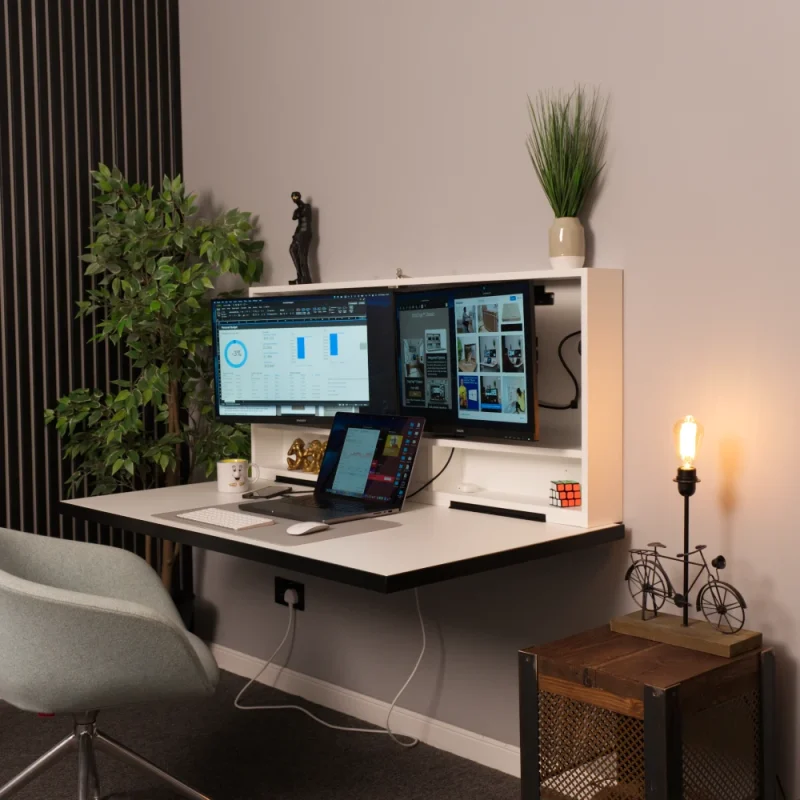 Large open hideaway desk connected to a laptop.