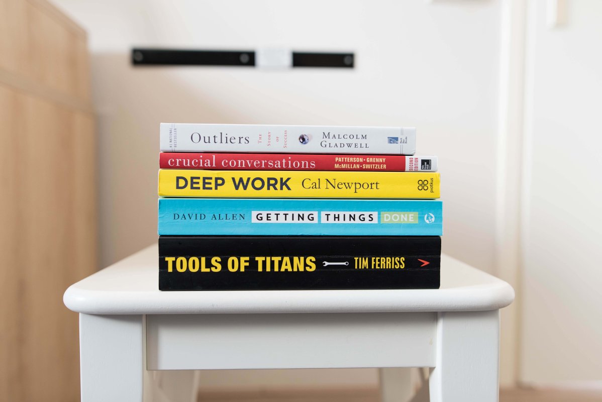 A pile of some of the best productivity books.