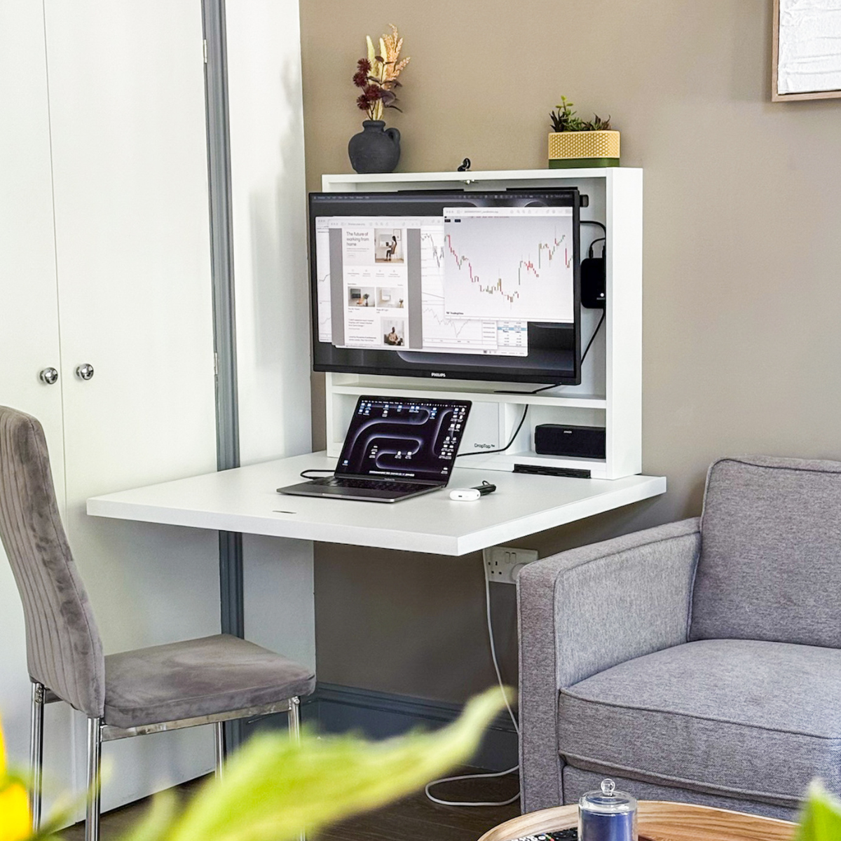 A space saving desk with integrated monitors, designed specifically for working from home
